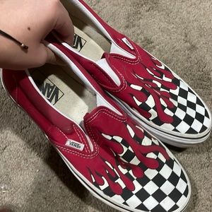 Checkered Vans with a red drip